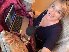 Sabrina Justison smiling while podcasting